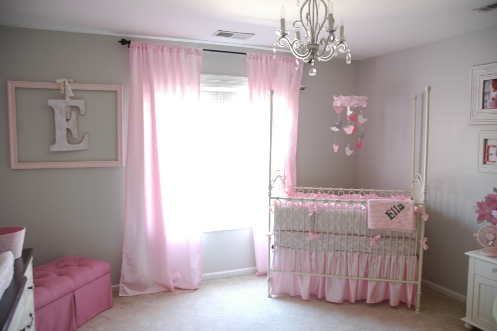 Endearing pink curtains for white wooden baby crib also pink