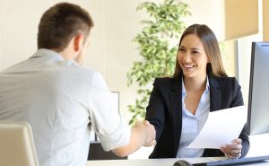 Successful job interview with boss and employee handshaking